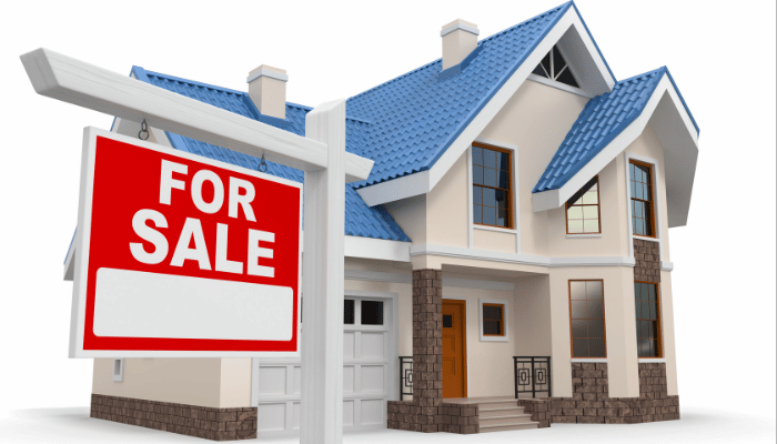 Computer generated rendering of a house with a for sale sign in the yard