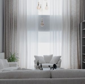 Beautifully furnished, bright and airy living room in a modern coastal vacation home, with neutral-toned furniture and lar...